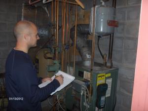 Checking boiler to make sure it complies with state & local codes